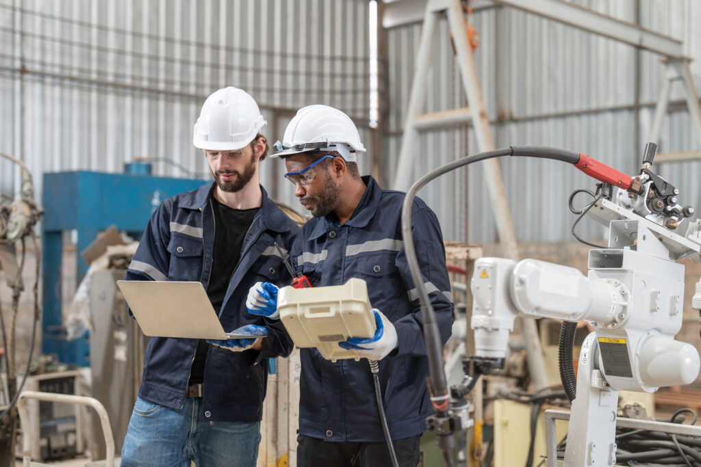 Two compliance officers at manufacturing site